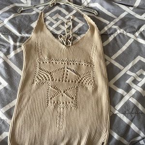 A Calvin Klein knit top.